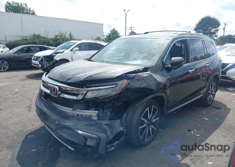 2019 Honda Pilot Elite z USA, uszkodzony, nr VIN 5FNYF6H00KB041094